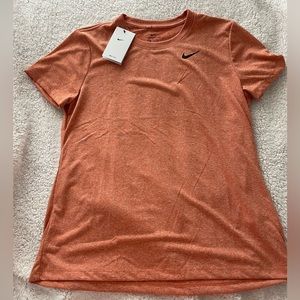 Nike tshirt, never worn new with tags, size L in women’s